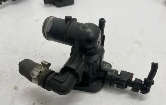 Thermostat/thermostat housing