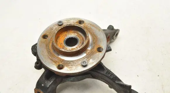 Opel Corsa F Front wheel hub spindle knuckle 9824439980