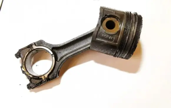Piston with connecting rod
