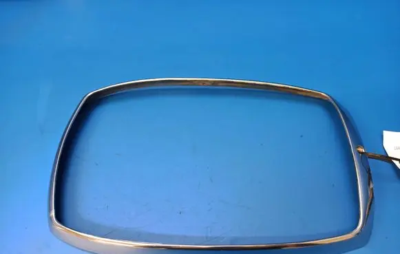 Mercedes-Benz COMPAKT W115 Under headlight/headlamp trim 100710