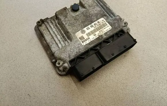 Volkswagen Touran I Engine control unit/module 03G906021NK 1039S17241 0281013440