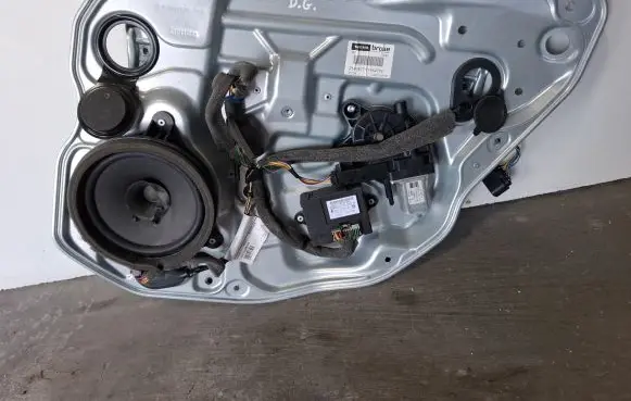 Rear door window regulator with motor