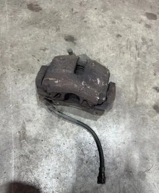 Volkswagen Golf VI Front brake caliper