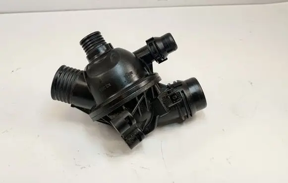 Thermostat/thermostat housing
