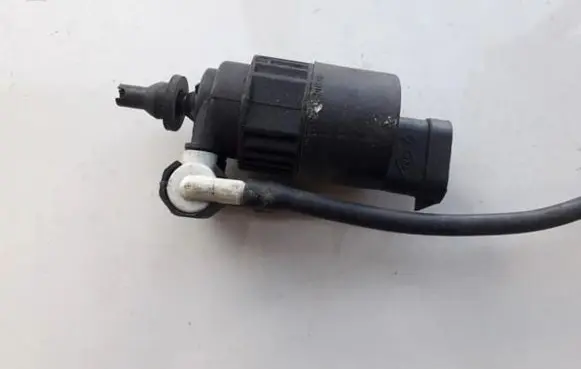 Renault Megane I Windscreen/windshield washer pump 7700821782