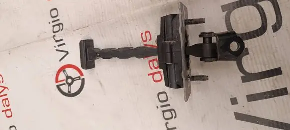 Front door check strap stopper