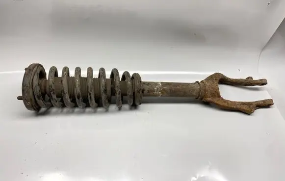 Front shock absorber with coil spring