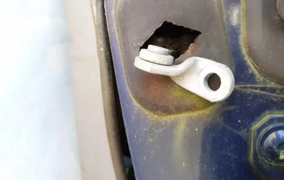 Rear door check strap stopper