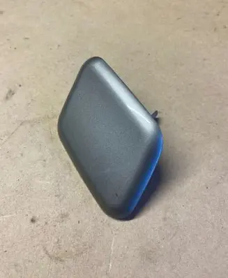 Headlight washer spray nozzle cap/cover