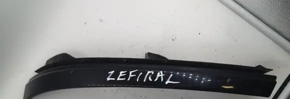 Chevrolet Zafira A Under headlight/headlamp trim 90580651