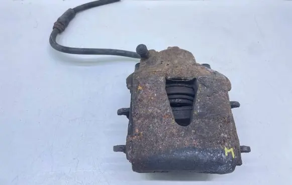 Volkswagen Golf VI Front brake caliper
