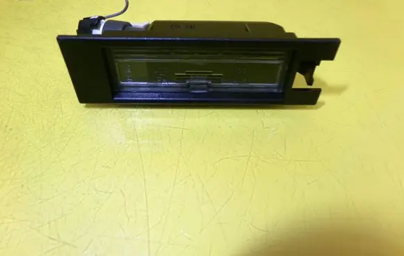 Opel Corsa C Number plate light 0461200