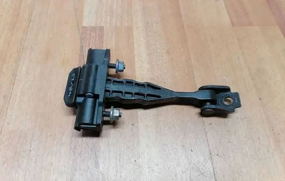 Rear door check strap stopper