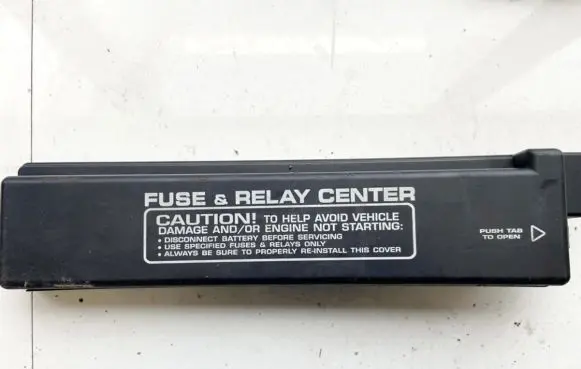 Chrysler Voyager Fuse box cover 4707779AB