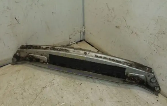 Top upper radiator support slam panel
