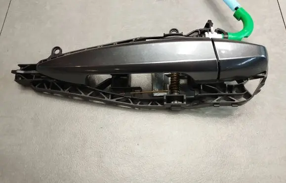 Rear door exterior handle/bracket