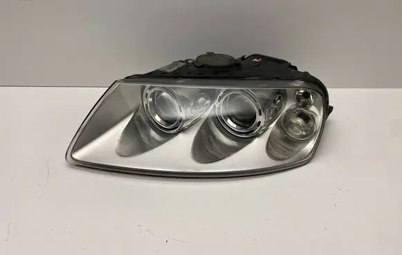Volkswagen Touareg I Headlight/headlamp 7L6941015BK 89307851