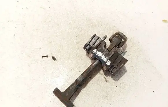 Rear door check strap stopper