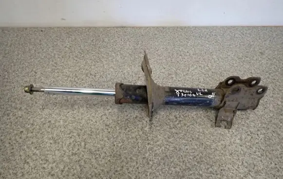 Nissan X-Trail T30 Front shock absorber with coil spring