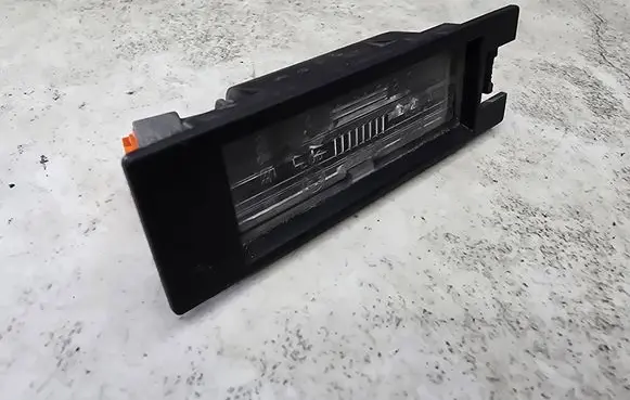 Opel Astra H Number plate light 13139990