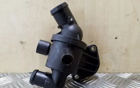 Thermostat/thermostat housing