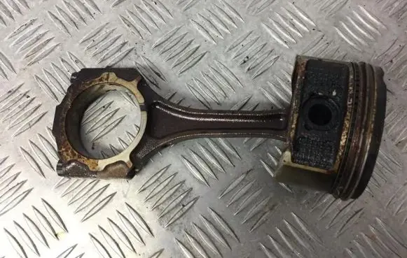 Piston with connecting rod