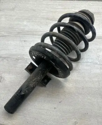 Front shock absorber with coil spring
