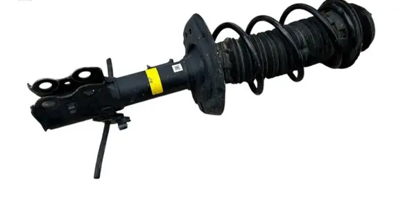 Toyota Yaris XP210 Front shock absorber with coil spring 48520K0090