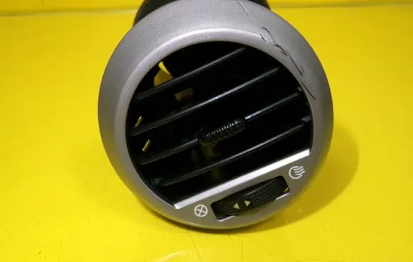 Dash center air vent grill