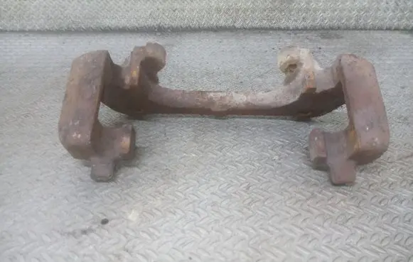 Volvo S80 Front Brake Caliper Pad/Carrier 