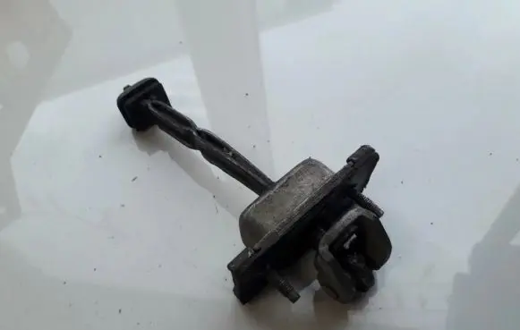 Ford Focus Rear door check strap stopper