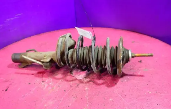 Ford Fiesta Front shock absorber with coil spring
