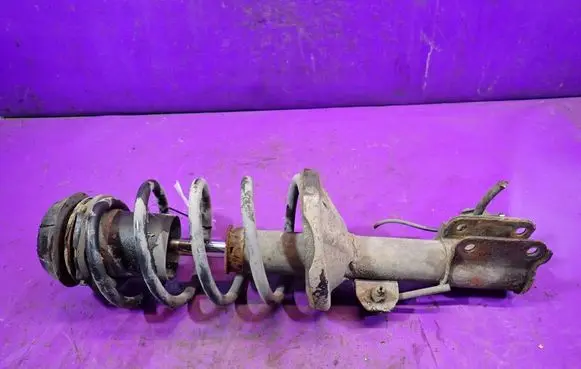 Chevrolet Nubira Front shock absorber with coil spring 