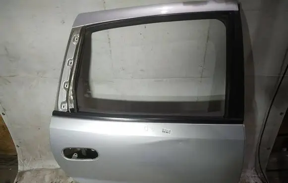Nissan Almera Tino Rear door PILKOS