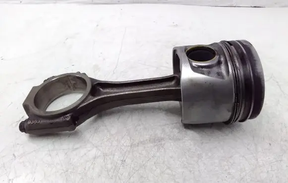 Piston with connecting rod