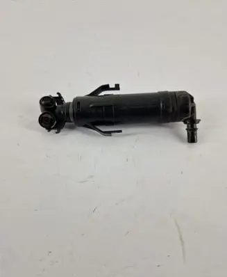 Volkswagen Touran II Headlight washer spray nozzle 1T0955104B