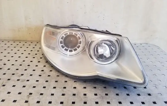 Volkswagen Touareg I Headlight/headlamp 7L6941032A 1LL24703204