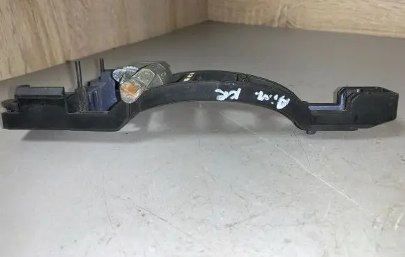 Rear door exterior handle/bracket