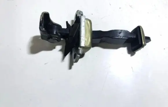 Front door check strap stopper