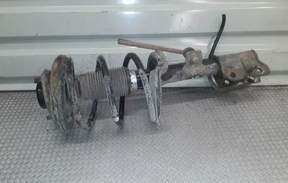 Front shock absorber with coil spring
