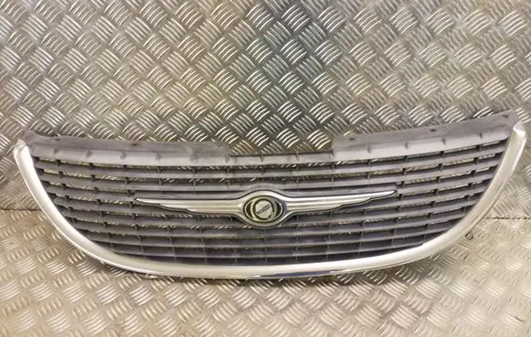 Chrysler Voyager Front bumper upper radiator grill 4857522AA