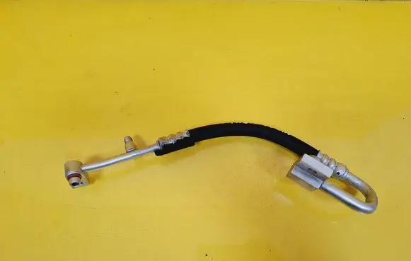 Chrysler Voyager Air conditioning (A/C) pipe/hose 05005212AD