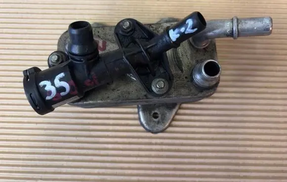 Thermostat/thermostat housing