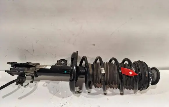 Opel Corsa D Front shock absorber/damper 13214354