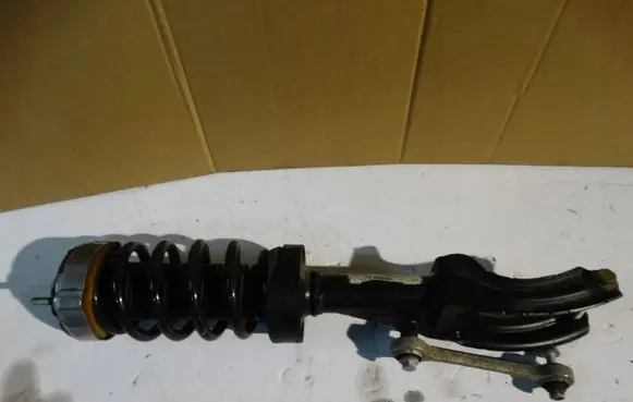 Volkswagen Touareg II Front shock absorber/damper 7P6413032AS