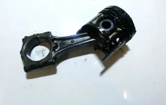 Piston with connecting rod
