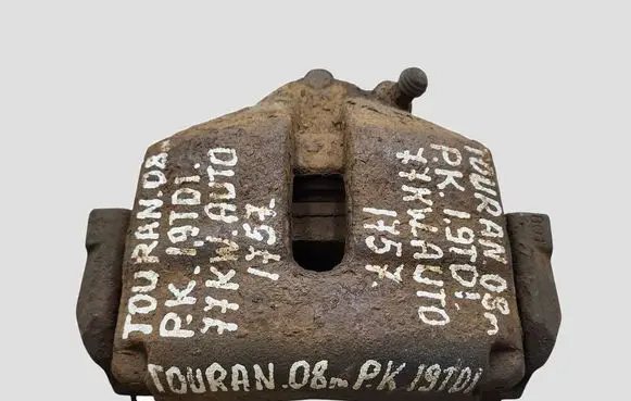 Volkswagen Touran I Front brake caliper