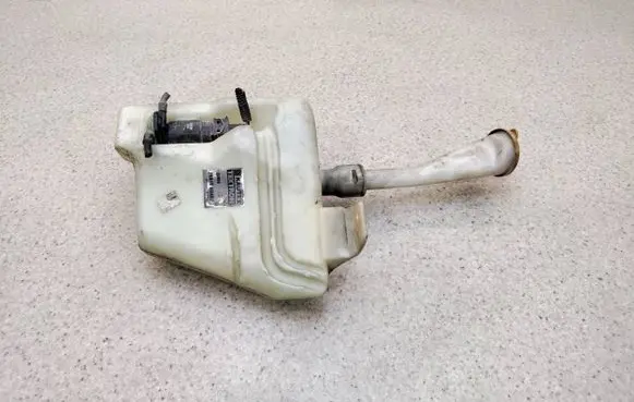 Nissan Primera Windshield washer fluid reservoir/tank 28910AU400