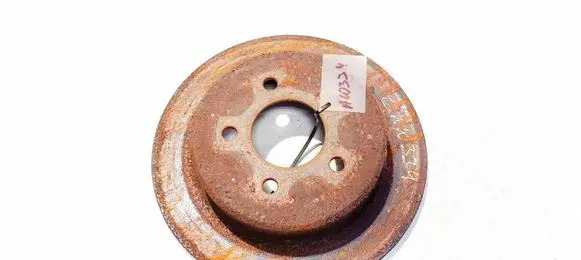 Chrysler Grand Voyager IV Rear brake disc neventiliuojamas