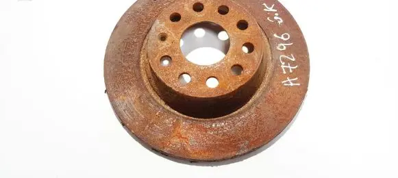 Volkswagen PASSAT B6 Rear brake disc neventiliuojamas